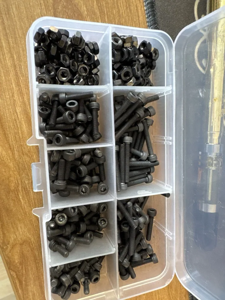 Kit of black cap screws and hex nuts